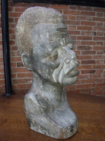 AFRICAN TRIBAL BUST SCULPTURED FROM GREY  SOAPSTONE MEASURING 14 INCHES HIGH
