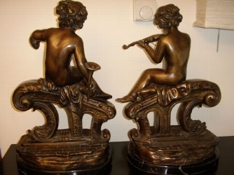 Antique PAIR OF BRONZE CHERUB MUSICIANS SITTING ON PLYNTHS SUPPORTED BY DOLPHINS 