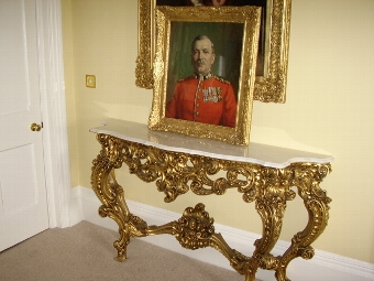 Antique MILITARY OIL PORTRAIT PAINTING OF A GRENADIER GUARD WEARING HIS RED TUNIC & MEDALS BY RESPECTED ENGLISH SCHOOL ARTIST ALFRED EGERTON COOPER BEING PRESENTED IN THE ORIGINAL DECORATIVE PLASTER GILT FRAME SIZE 31 X 27 INCHES  