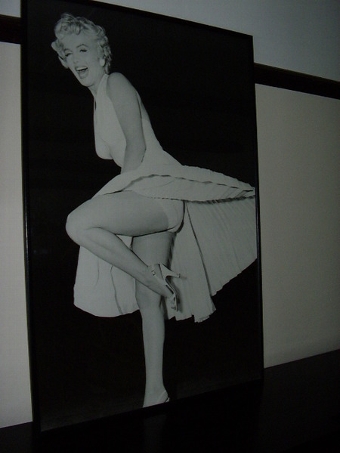 MARILYN MONROE FRAMED ADVERTISEMENT ON BOARD C1950 24INS X 36 INS