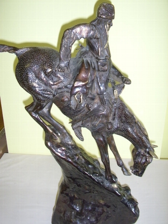 Antique BRONZE SCULPTURE OF SIOUX WARRIER ON HORSEBACK AFTER REMINGHTON C1920 