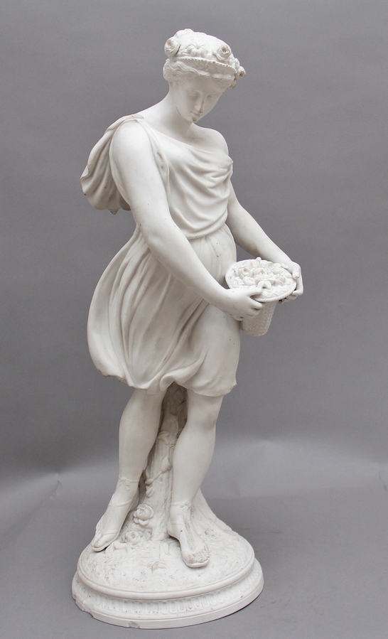 Antique 19th Century parian figure of a flower maiden