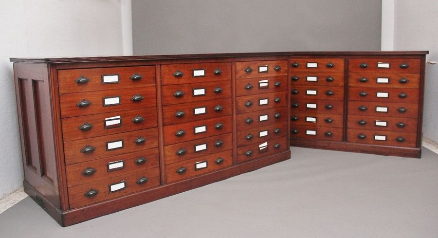 A pair of early 20th Century mahogany multi drawer chest's