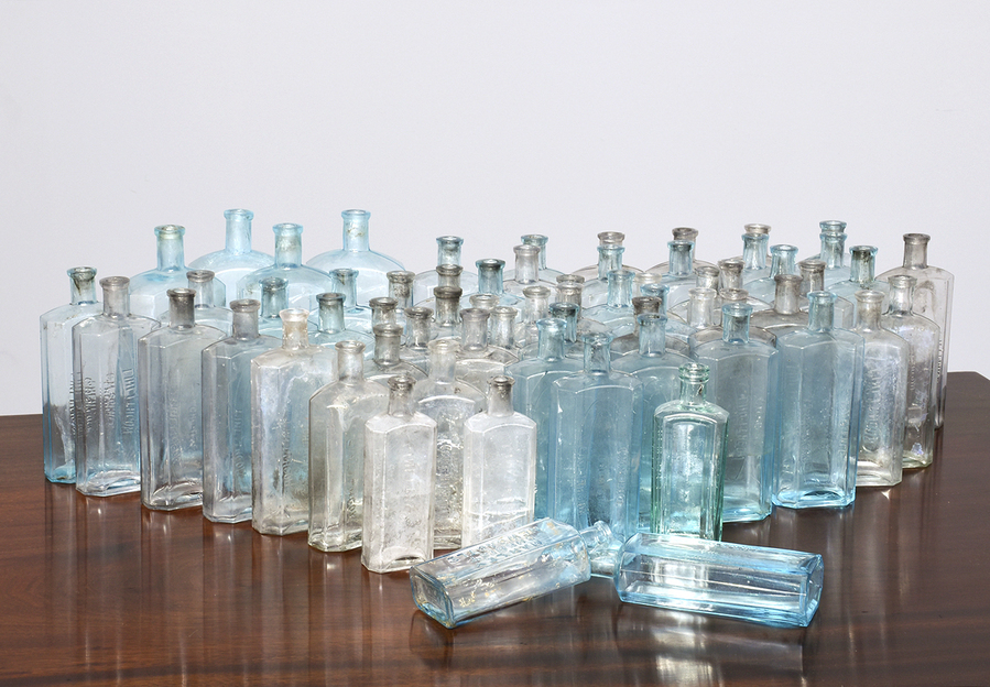 Antique 100 Edwardian medicine bottles bearing the label C.M.SPENCE CHEMIST LINLITHGOW