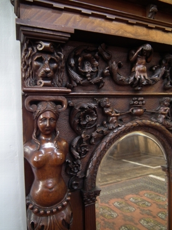 Antique Continental Carved Walnut and Elm Mirror
