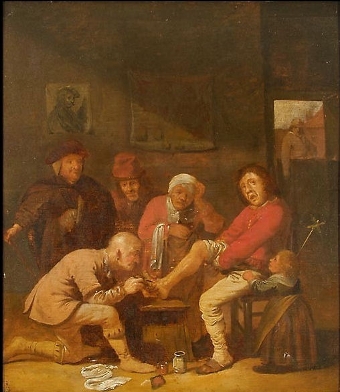 A Surgeon tending to his patients foot in an interior