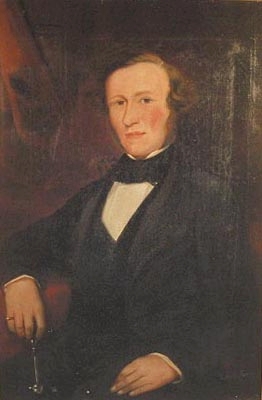 Portrait of the veterinary  surgeon Joseph White holding a tooth extractor