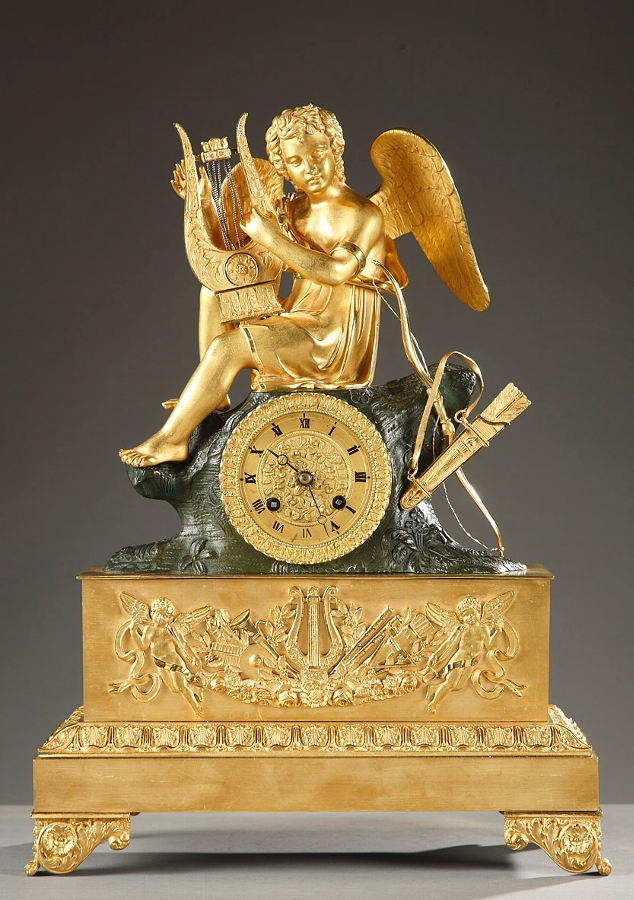 Ormolu mantle clock representing a cupid playing the harp, early 19th century