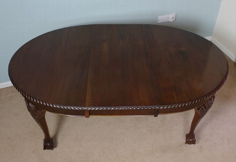 Antique mahogany oval extending dining table