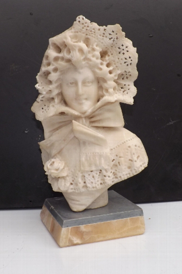 Carved marble figure of Georgian lady in her bonnet & blouse