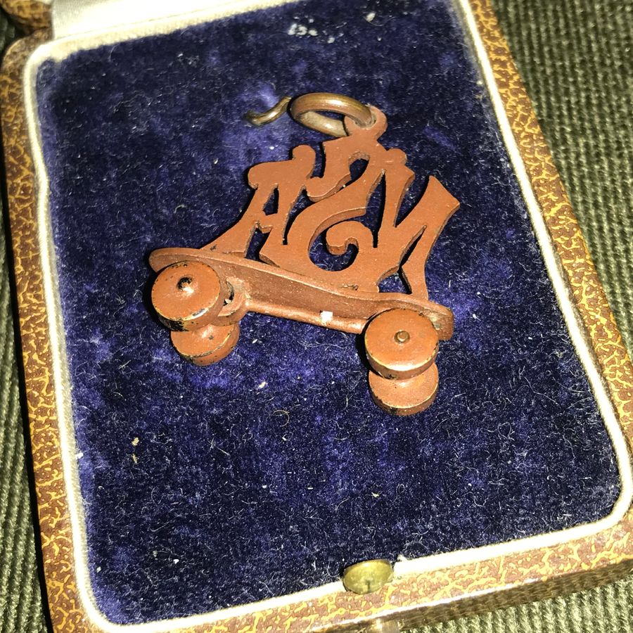 Antique Rare Sweethearts brooch in the shape of an roller skate