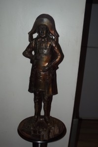 FIRESIDE CAMPANION SET IN SHAPE OF TOWN CRIER METALWARE