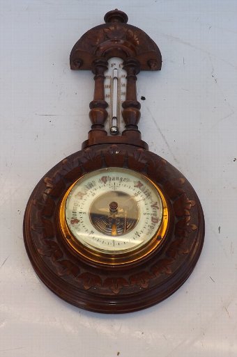 Barometer/thermometer carved walnut case. SBB
