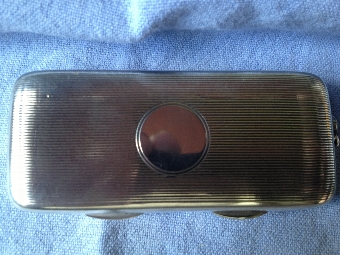 Silver, gold, and amber cigarette holder and case