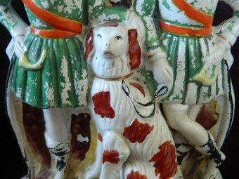 Antique Staffordshire flatback figure hunters and dog