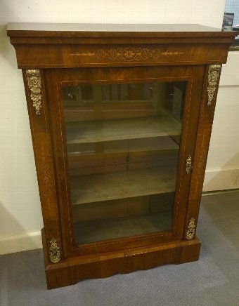 Impressive burr walnut Pier Cabinet with original mounts and key.