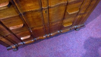 Antique most unusual shaped front chest of drawers