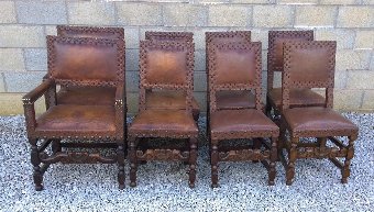 Antique Set of 8 oak dining chairs in Jacobean Style.Very fashionable worn leather. 6 Stand chairs and two carvers