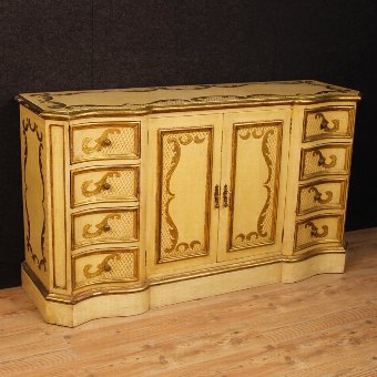 Italian sideboard in lacquered and gilded wood