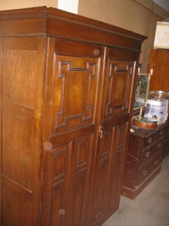 reproduction Jacobean style double wardrobe.