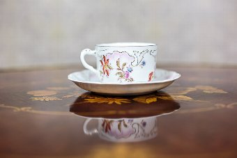 A Porcelain Cup with a Saucer