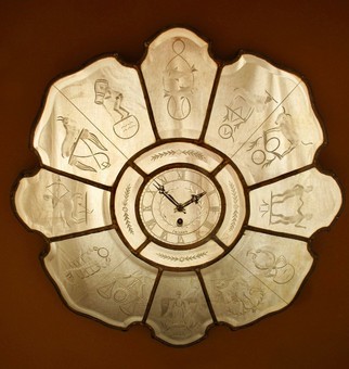 A very interesting and rare art deco mirrored wall clock.