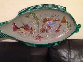 Antique French mid-20th century fish plate 61cm by 31cm flamboyantly decorated in a multitude of colours and two images of fish  