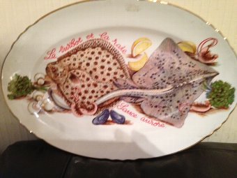 A very tastefully decorated French 38cm by 26cm mid-20th century fish plate in excellent condition