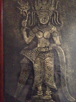 Antique Very early Indian 28cm by 45cm artwork of a goddess portrayed in raise gold on aged black cloth. 