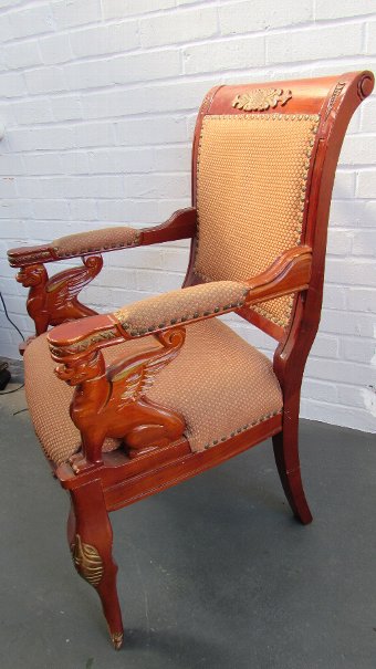 Chinese carver chairs with dragon motif .