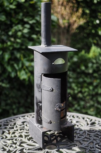 Antique Mini steel log burner stove ornament garden feature