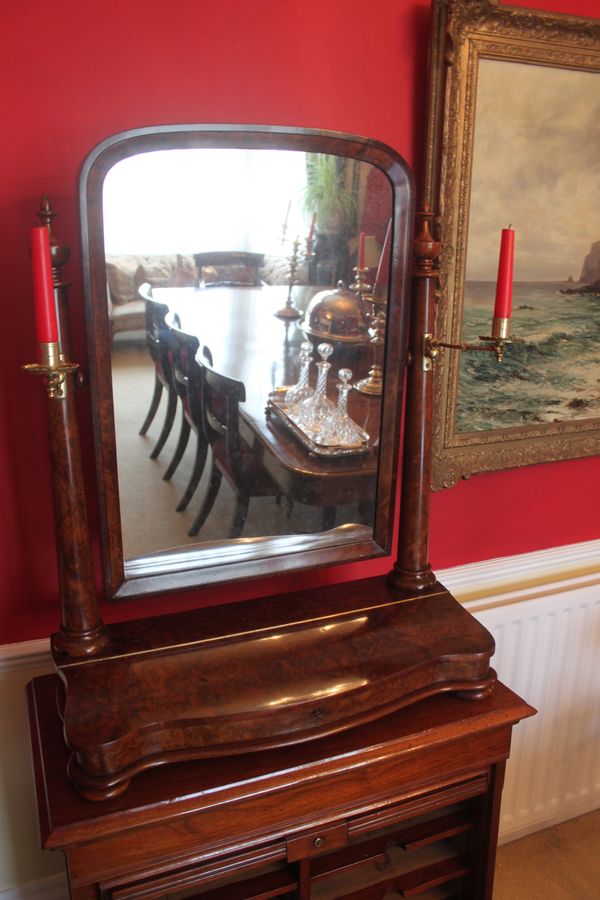 An outstanding quality large Victorian burr walnut toilet mirror.