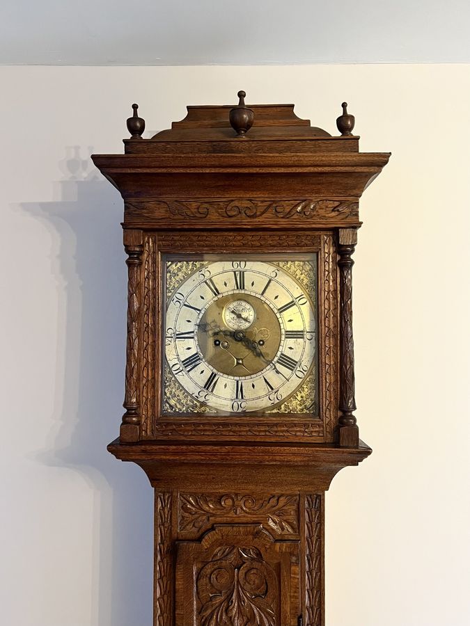 Antique Outstanding quality 18th century carved oak long case clock by Smith Macclesfield