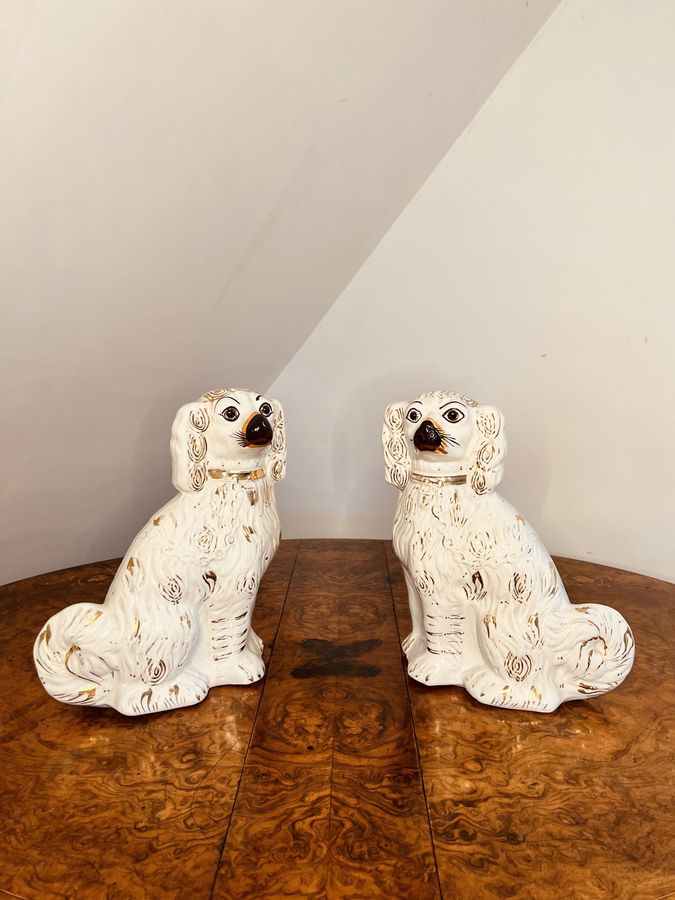 Antique Charming pair of antique Victorian Staffordshire seated spaniels 