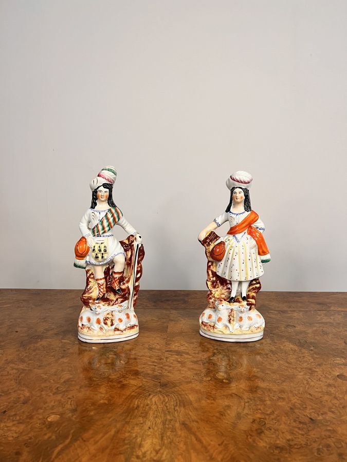 Antique Quality pair of antique Victorian Staffordshire highland figures 