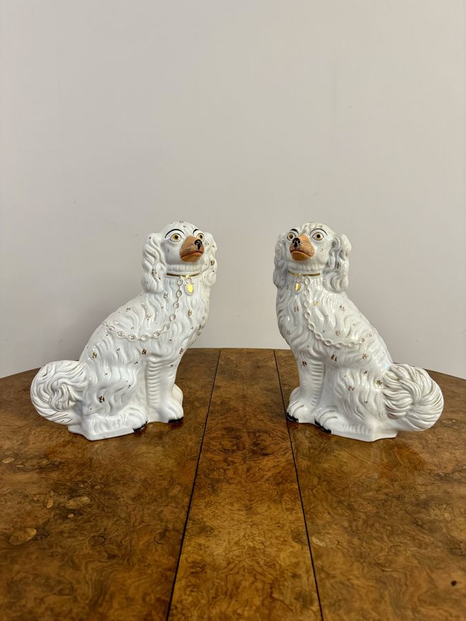 Antique Large pair of antique Victorian seated Staffordshire spaniel dogs