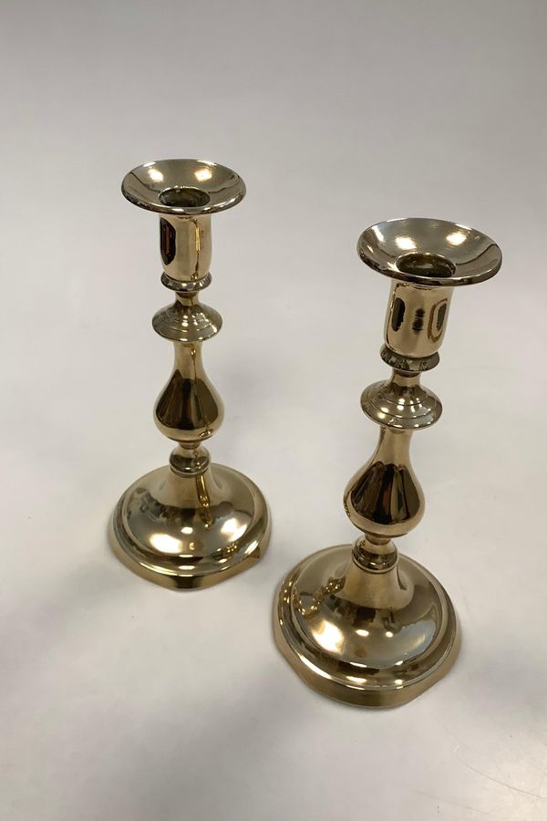 Antique Antique Pair of tall Candlesticks in Brass