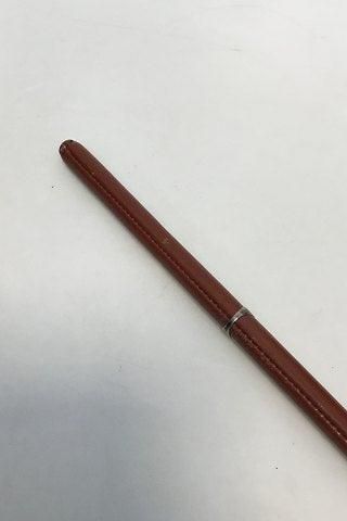 Antique English cavalry stick in wood with wound and stitched  leather.