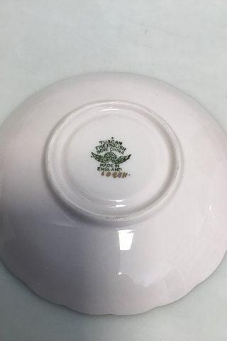 Antique English, R H & S L Plant (Ltd) pink porcelain cup and saucer with gilt rim.