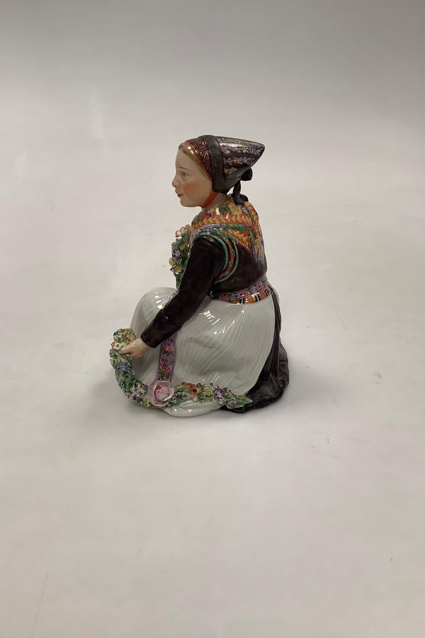 Antique Royal Copenhagen Overglaze figurine of Amager Flower Girl No 12412