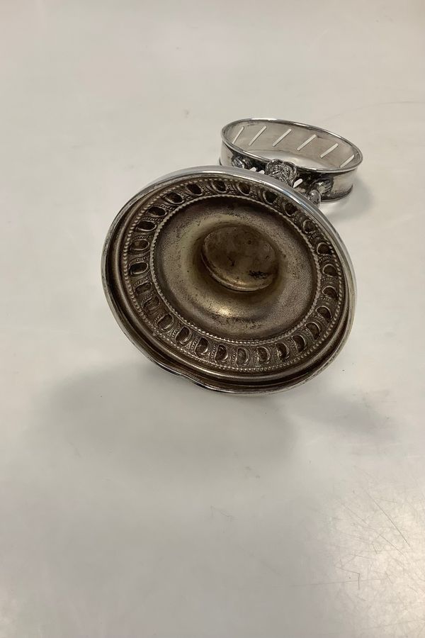 Antique Silver-plated watch holder with a woodsman