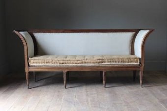 An elegant C18th French oak sofa