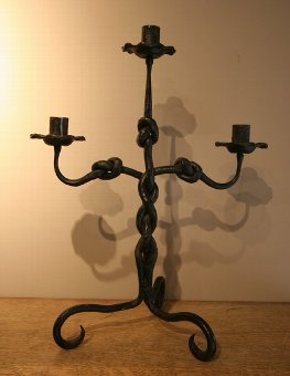 A pair of 1940s iron candleabra