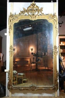A huge carved and gilded country house mirror