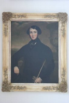 A C19th country house painting of a young Gent