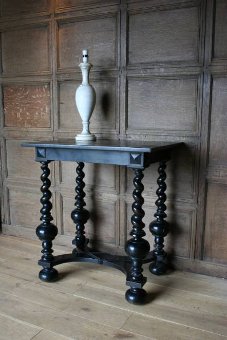 A C19th ebonised console table