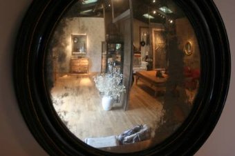 A C19th ebonised convex mirror