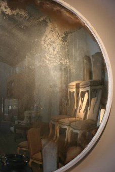 A huge and fantastic early C20th convex mirror