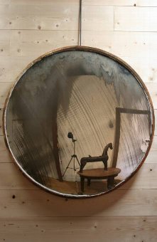 A huge and fantastic early C20th convex mirror
