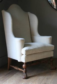 A huge pair of C19th wing armchairs